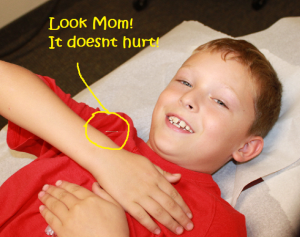Child receiving Acupuncture